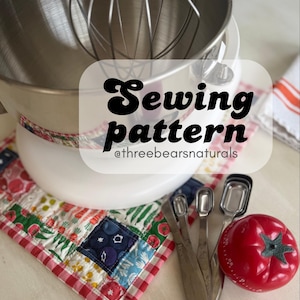 May include: A set of three ceramic mugs with a speckled, matte finish. The mugs are in shades of cream, light gray, and dark gray. Each mug has a simple, minimalist design and a rounded handle.