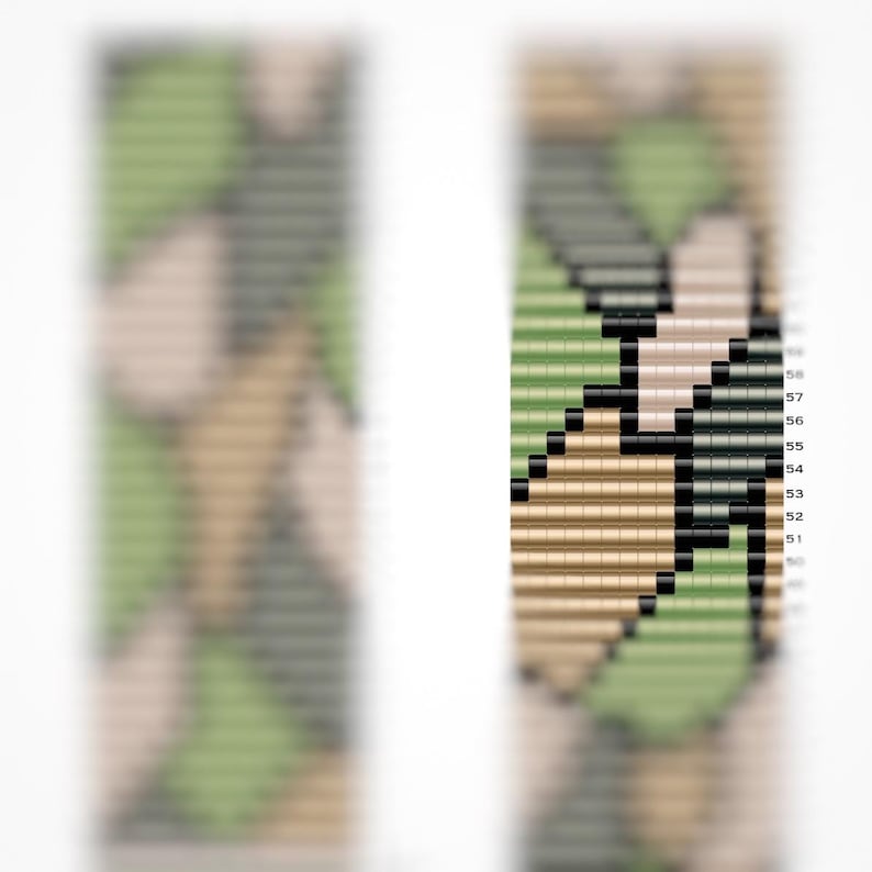 May include: A close-up of a beaded bracelet with a camouflage pattern in shades of green, brown, and beige. The bracelet is made with small, square beads.