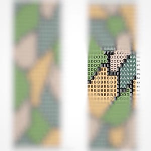 May include: A close-up of a diamond painting with a black and white design. The design is of a person's face with a black background and white details. The diamond painting is partially completed, with some of the diamonds already placed.