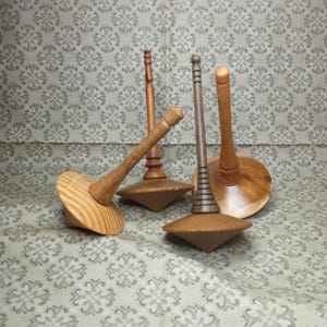 Beautiful large customizable wooden friction spinning top.