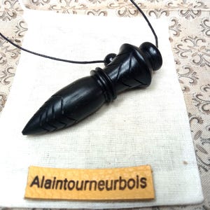 Ebène. Thot 22 Grammes - 7 cm - Ogive ø 1,6 cm - Véritable pendule Égyptien pour radiesthésie, divination, géobiologie. Gravé et lesté.