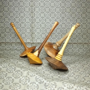Large customizable wooden friction spinning top.