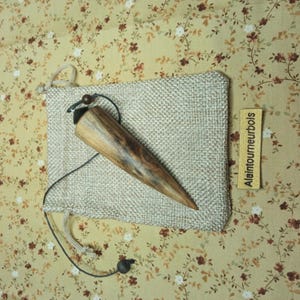 Ebony and birch. 26g weighted drop pendulum for dowsing, divination, springs, and geobiology.