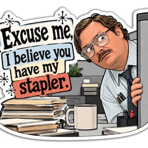 May include: A die-cut sticker featuring a cartoon illustration of a man with glasses and a mustache peeking from behind a cubicle wall. The text reads, Excuse me, I believe you have my stapler. A stack of papers and a white coffee mug are visible.