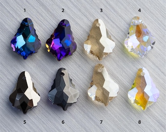 May include: Eight crystal teardrop pendants in various colors, including blue, purple, clear, black, and gold. The pendants are arranged in two rows of four, with numbers 1 through 8 below each pendant.