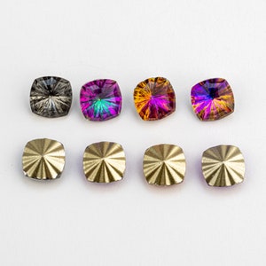 May include: Assortment of ten faceted gemstone cabochons, including six iridescent rainbow colors and four gold-toned metal cabochons.