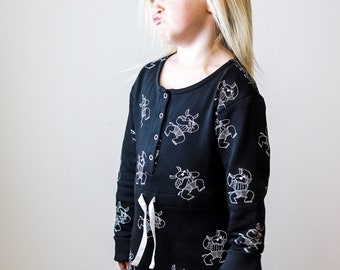 Girl's sweater dress | gender neutral | long sleeved | monochrome rhino print.