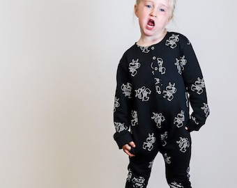 Children's romper | gender neutral | long sleeved | monochrome rhino print.