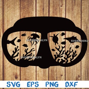 May include: Black silhouette of a scuba diving mask with a view of underwater sea life, including coral, fish, a jellyfish, and a sea turtle.