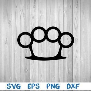 May include: Black and white illustration of a brass knuckle weapon. The weapon is a circular shape with four holes in the center.