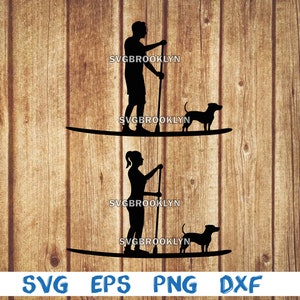 May include: Black silhouette graphic of two people paddleboarding with dogs. The image includes the text "SVGBROOKLYN" and file type abbreviations "SVG EPS PNG DXF" on a wood grain background.