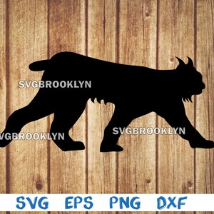 May include: Black silhouette of a lynx walking to the right. The image is on a woodgrain background.