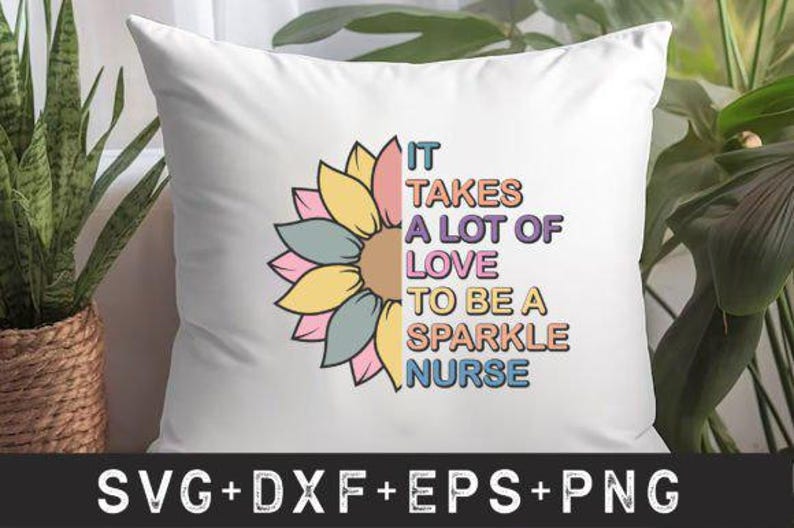 May include: White cushion featuring a colourful sunflower design and the text "IT TAKES A LOT OF LOVE TO BE A SPARKLE NURSE." The cushion is set against a backdrop of greenery and a woven basket.