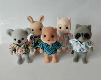Shirts and dresses for animal toy. Bold collection forest fashion clothes.