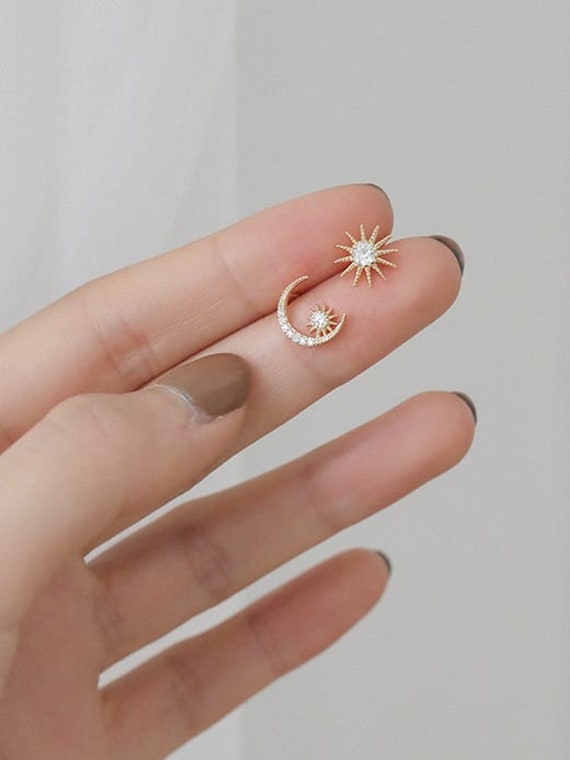 Gold sun and store moon earrings