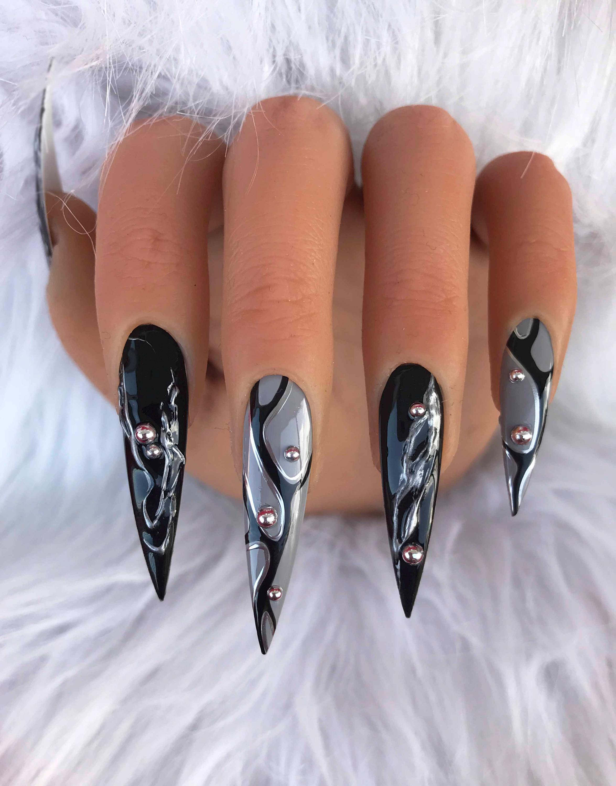 Black Nails with Metallic Accents