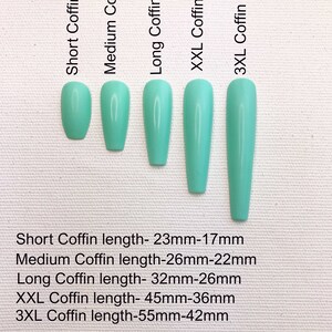 May include: Five different sizes of light turquoise coffin-shaped false nails. The sizes are labeled "Short Coffin", "Medium Coffin", "Long Coffin", "XXL Coffin", and "3XL Coffin". The measurements for each size are listed below the nails: Short Coffin length- 23mm-17mm, Medium Coffin length-26mm-22mm, Long Coffin length- 32mm-26mm, XXL Coffin length- 45mm-36mm, 3XL Coffin length-55mm-42mm.