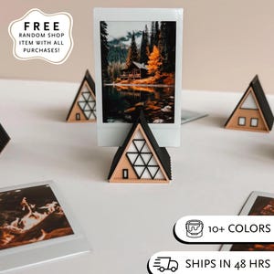 polaroid picture stand a-frame cabin decor instax film stand photo gifted fujifilm instax camera pic. stand framed photo gift travel airbnb