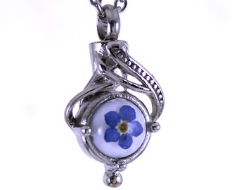 Urna conmemorativa de cenizas de cremación con grabado de nomeolvides entrelazados de plata, collar de urna de acero inoxidable pulido