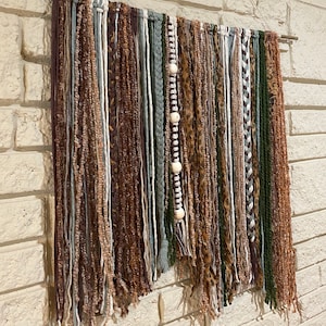 Cheetah print, earth tones, green, brown, yarn and mixed fibers wall hanging tapestry
