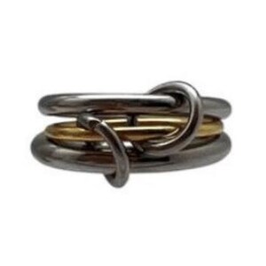 May include: A silver and gold ring with a unique interlocking design. The ring is made of three bands, two silver and one gold, that are intertwined.