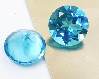 Schweizer Blautopas, 9 mm runder Brilliantschliff, loser Edelstein