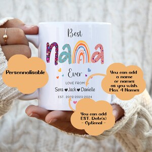 May include: White ceramic mug with the text "Best Nana Ever" in colorful letters with a rainbow and hearts. The text "Love From" is below the word "Ever" with space for three names and the text "EST. 2022/2023/2024".