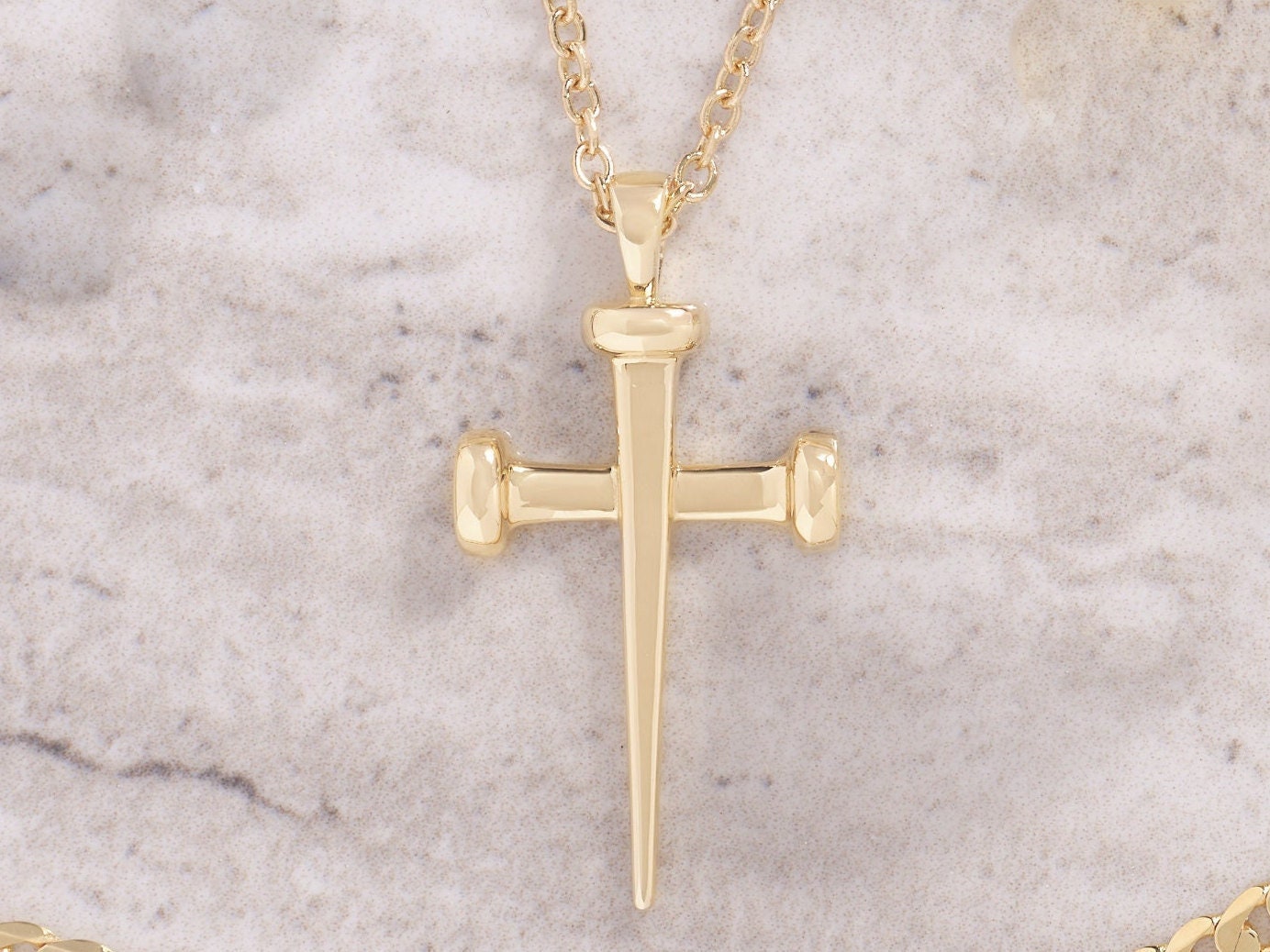 Gold nail shop cross