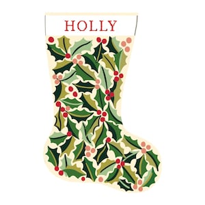 May include: A Christmas stocking with a cream-colored background, decorated with green holly leaves and red berries. The word "HOLLY" is printed in red at the top of the stocking.