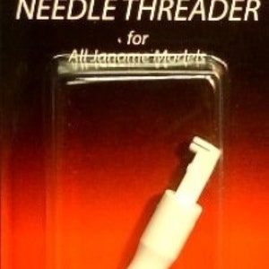 May include: White plastic needle threader for all Janome sewing machines. The threader is a small, handheld tool with a loop at one end and a handle at the other.