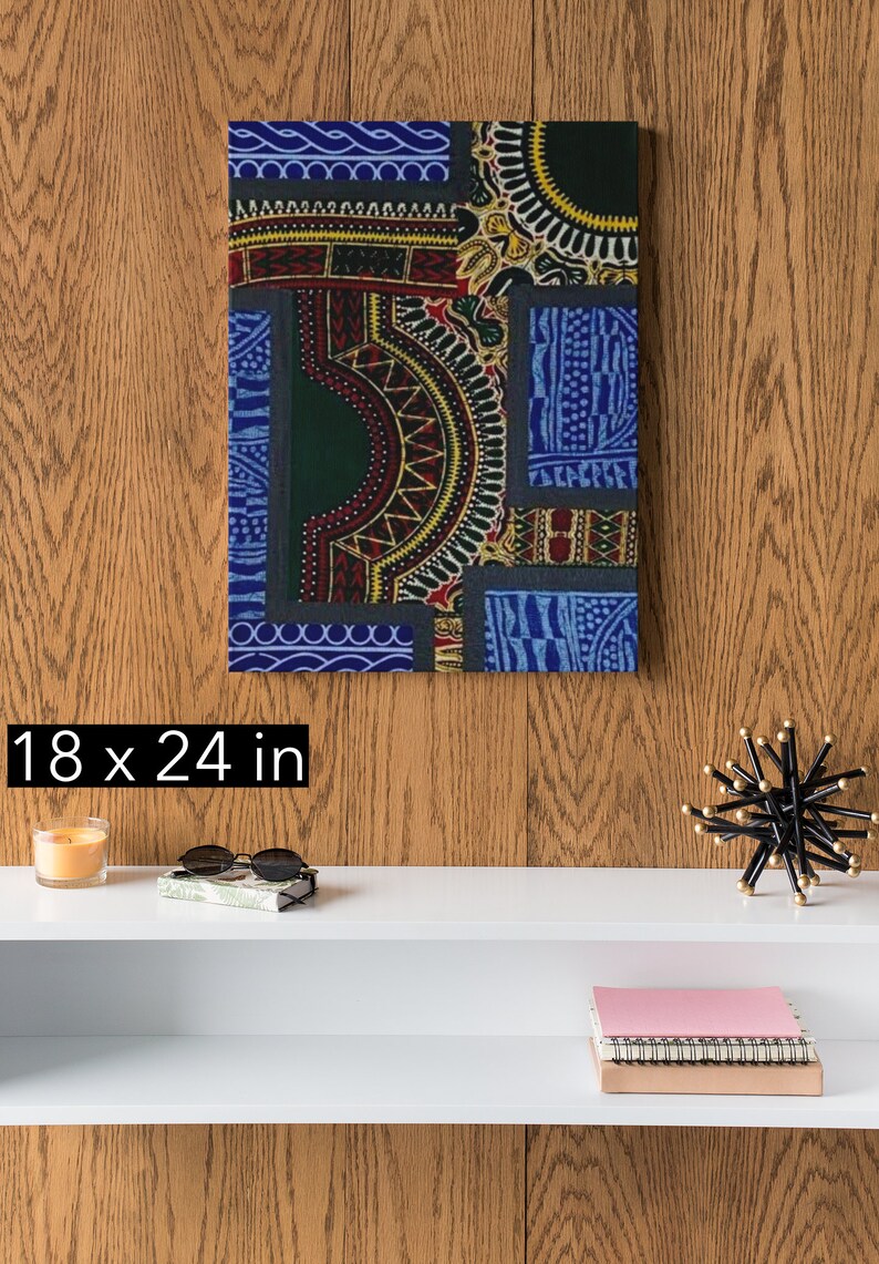 May include: A colorful abstract canvas print with geometric patterns in shades of blue, green, red, and yellow. The print is 18 inches by 24 inches.