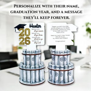 Back side of personalized graduation money holder showing custom message engraving option. Wooden graduation money tree gift for Class of 2026 with rolled cash slots. Graduation decorations Class of 2026 and meaningful keepsake cash gift.