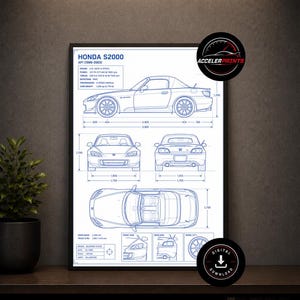 May include: A framed technical blueprint poster of a Honda S2000 AP1, featuring side, front, rear, and top views with detailed specifications, dimensions in millimeters, and technical diagrams. The print includes the text Honda S2000 AP1 (1999-2003).
