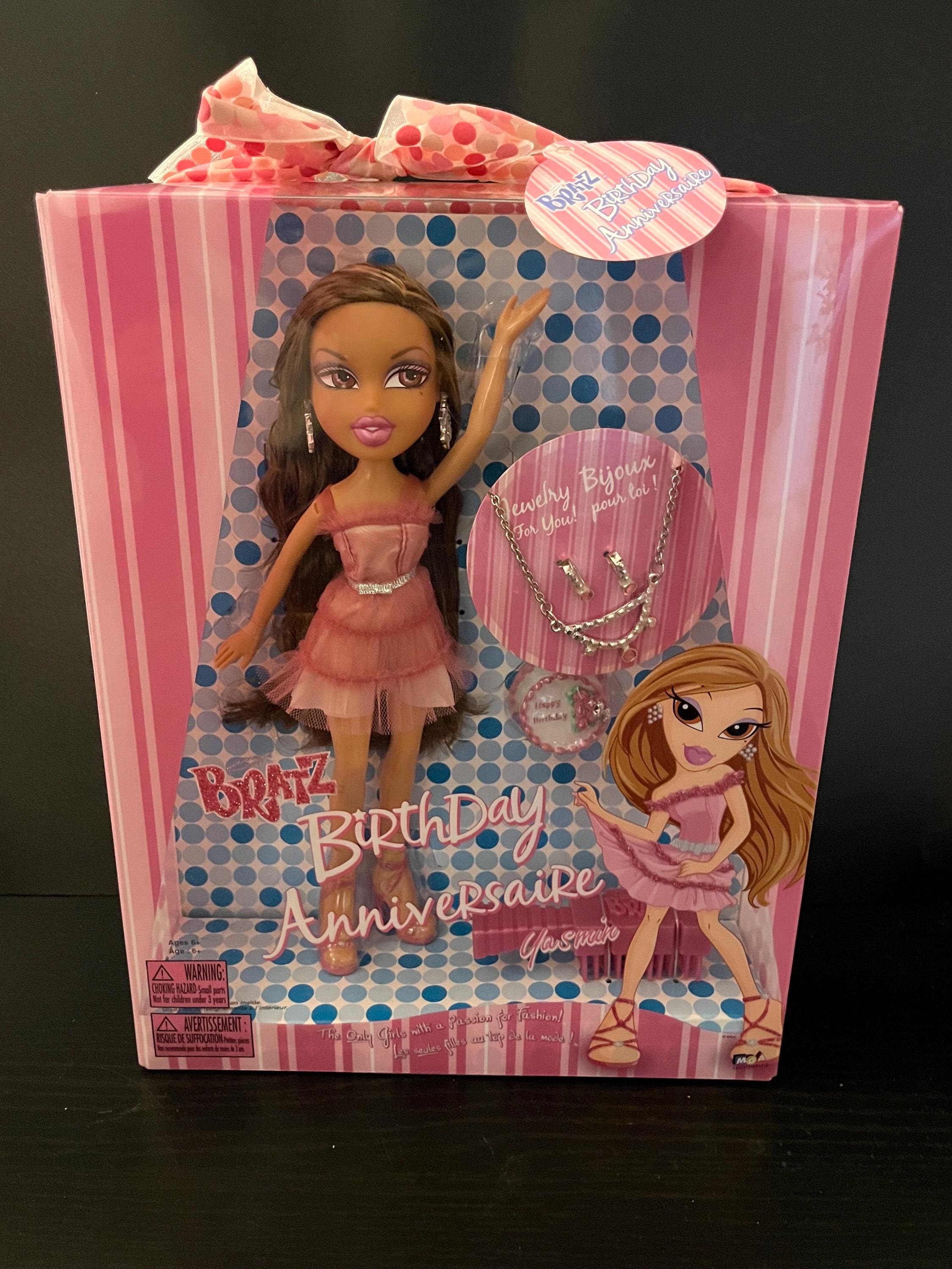 bratz yasmin pink dress Pop Starz Yasmin makeover! Yeah, the Ariana inspiration is predictable but that high ponytail was asking for it. The Sweetener World Tour maroon/ pink puffy sleeved outfit may be years old but it