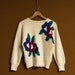 see more listings in the Sweaters and Jumpers section