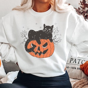 Black Cat on Pumpkin Sweatshirt, Sweater for fall, Black Cat Sweater, Halloween Black Cat Design, Halloween Gifts for Cat Owner.