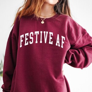 festive af sweatshirt