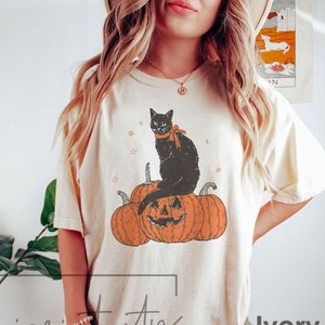 Comfort Colors® Black Cat on Pumpkin shirt, shirt for fall, Black Cat t-shirt, Halloween Black Cat Design, Fall Shirt,  iprintasty halloween