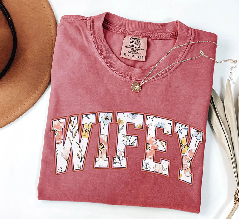 Comfort Colors® Floral Wifey T-Shirt, Bride Shirt, Bridal Shower Gift, Honeymoon Vibes, Wifey T-Shirt, Bride Groom, Honeymoon T-shirt.