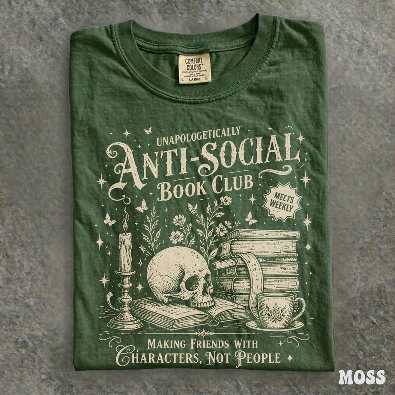 May include: Moss green t-shirt with the text "UNAPOLOGETICALLY ANTI-SOCIAL BOOK CLUB" and a graphic of a skull, books, and a teacup. The shirt also says "MAKING FRIENDS WITH CHARACTERS, NOT PEOPLE".