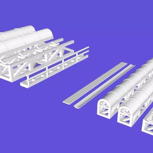 Puede incluir: Modelos arquitectónicos blancos renderizados en 3D de un sistema de túneles, que incluyen secciones de túnel arqueadas, vigas de soporte y rieles laterales. Los componentes están dispuestos sobre un fondo azul, lo que sugiere un concepto de construcción o diseño.