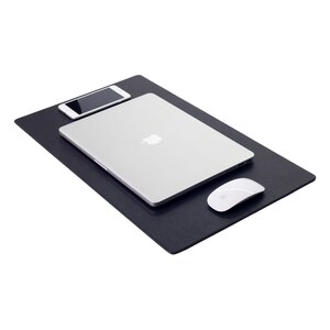 May include: A black desk mat with a laptop, a smartphone, and a white wireless mouse on top.