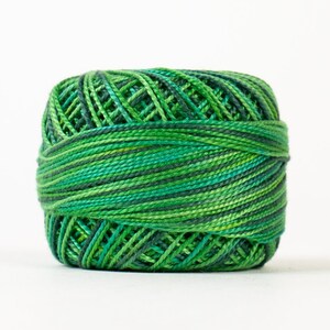May include: A ball of green and dark green embroidery floss.