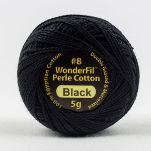 May include: A black ball of WonderFil Perle Cotton thread, size #8, 100% Egyptian Cotton, double gassed & mercerized. The label reads "WonderFil Perle Cotton Black 5g".