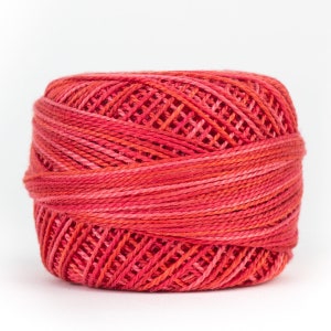 May include: A ball of red and pink embroidery floss.