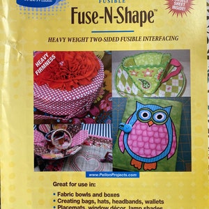 May include: Pellon Fuse-N-Shape heavy weight two-sided fusible interfacing, 15 inches by 36 inches (38.1 cm by 91.4 cm), made in the USA.  The package shows examples of projects that can be made with this interfacing, including a fabric bowl, a teacup, and an owl.