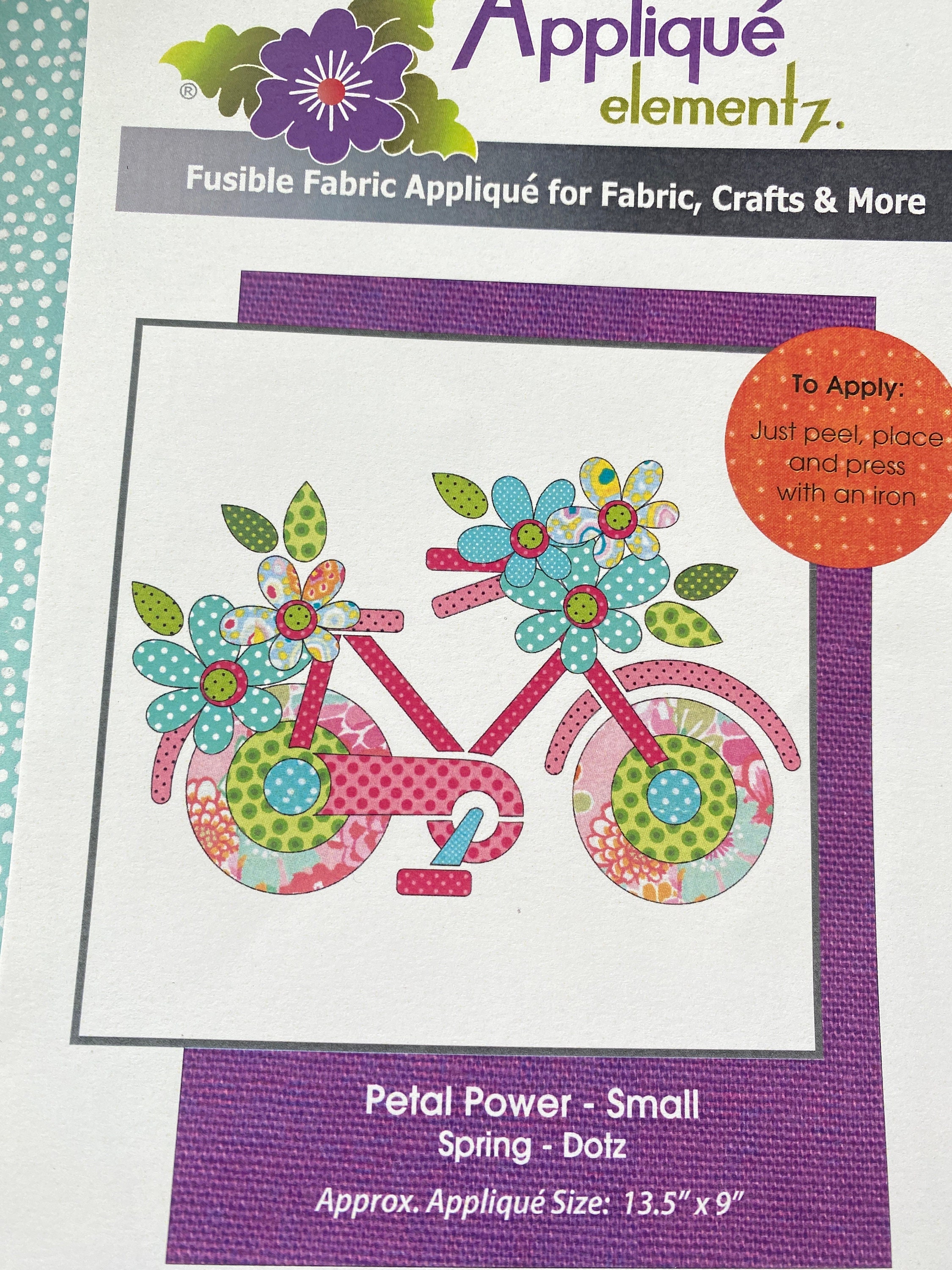 Elementz Fusible Fabric Applique', retail 21.95, Petal Power, Bicycle, Laser cut shapes, place and iron, adjustable until fused, 13 x 9"