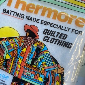 May include: A package of Thermore batting made especially for quilted clothing. The package features a colorful illustration of a person wearing a quilted jacket.