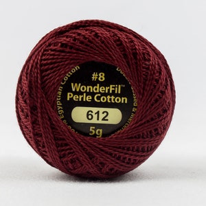 May include: A spool of maroon #8 WonderFil Perle Cotton thread, labeled with the number 612 and 5g.