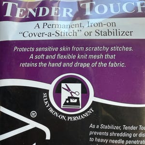 May include: A package of Tender Touch stabilizer. The package has a purple and black design with white text. The text reads "Tender Touch" and "A Permanent, Iron-on Cover-a-Stitch or Stabilizer". The package also features a logo with scissors and an iron.